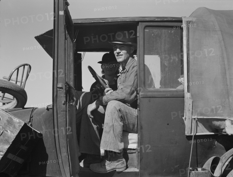 Texas family looking for work in the carrot harvest, California, 1937. Creator: Dorothea Lange.