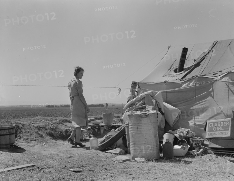 Young family just arrived from Arkansas camped along the road, Imperial Valley, California, 1937. Creator: Dorothea Lange.