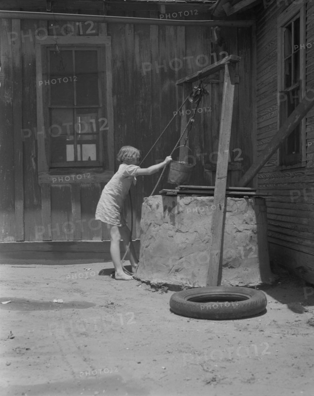 One of a Texas sharecropper's ten children, Hall County, Texas, 1937. Creator: Dorothea Lange.