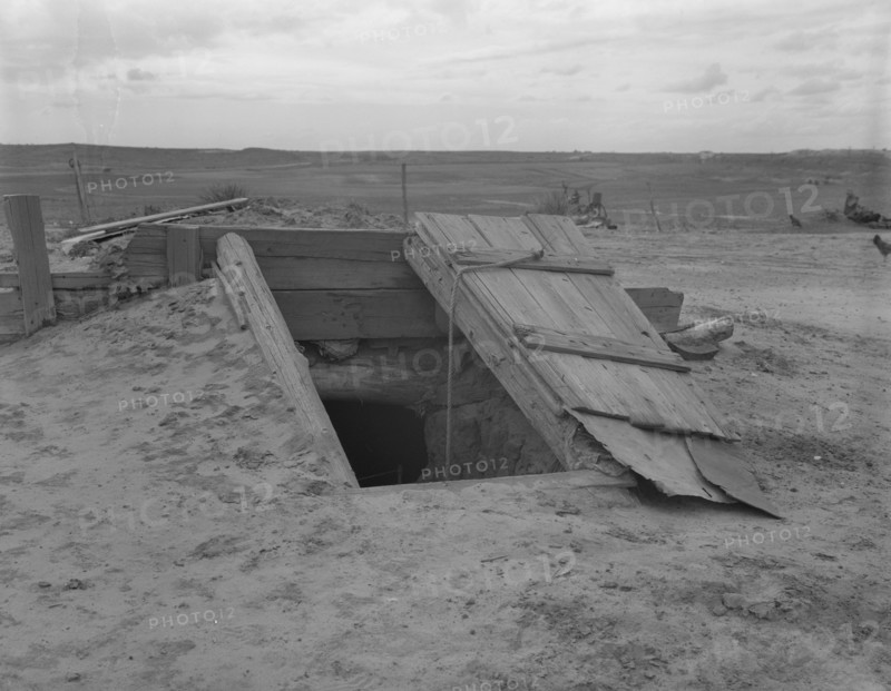 Storm cellar on the Texas plains, West Texas Panhandle, 1937. Creator: Dorothea Lange.