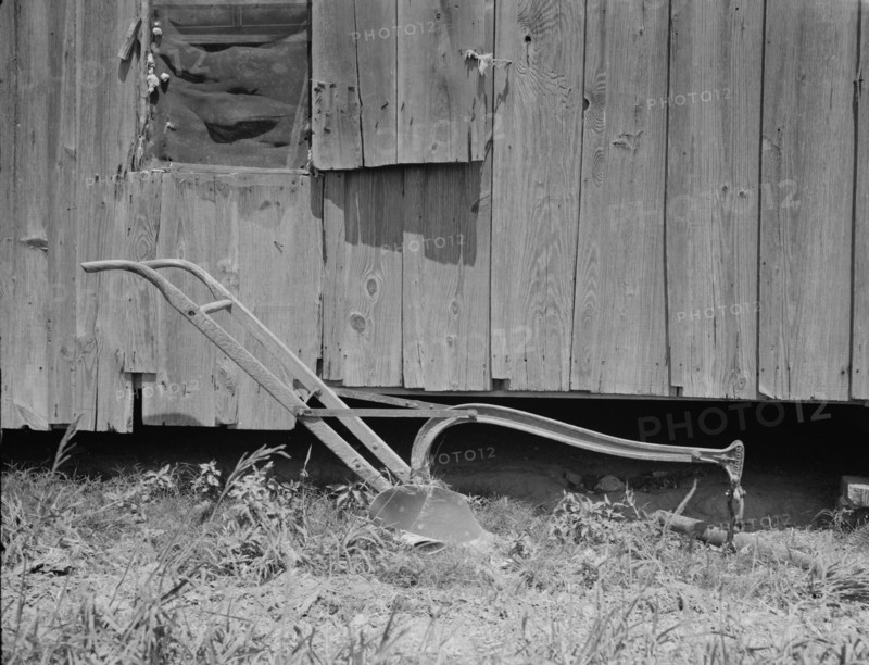 Sharecropper's cabin and sharecropper's tool, Mississippi, 1937. Creator: Dorothea Lange.