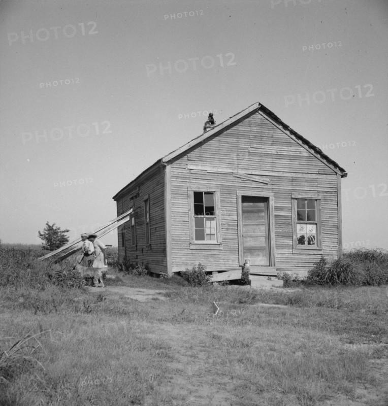 School in center of the mechanized plantation area of the Mississippi Delta, 1937. Creator: Dorothea Lange.