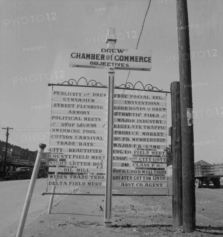 Chamber of Commerce sign, Drew, Mississippi, 1937. Creator: Dorothea Lange.