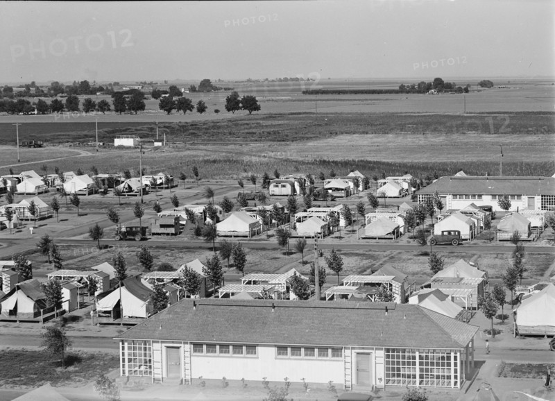 Farm Security Administration camp for migrant agricultural workers at Shafter, California, 1938. Creator: Dorothea Lange.