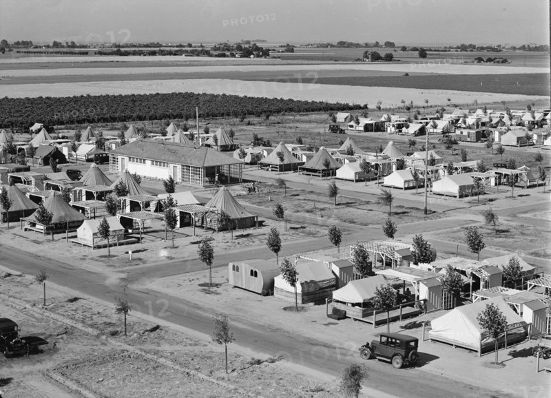 Farm Security Administration camp for migrant agricultural workers at Shafter, California, 1938. Creator: Dorothea Lange.
