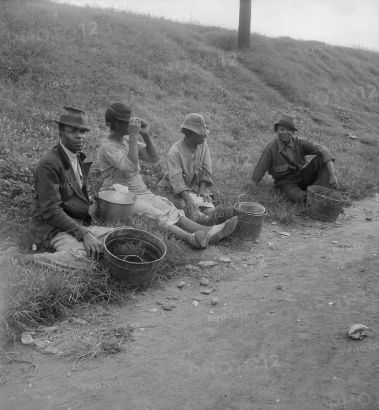 Berry pickers at 5 am, waiting for the truck to haul them to work, Memphis, Tennessee, 1938. Creator: Dorothea Lange.