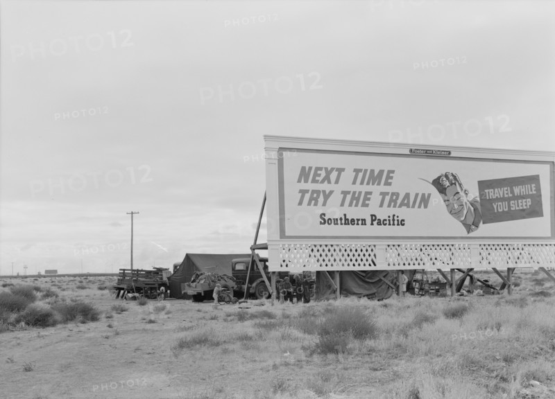 Three families camped on the plains along US 99 in California, 1938. Creator: Dorothea Lange.