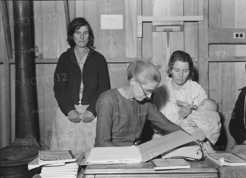 Meeting of the Mothers' Club in Arvin camp for migrant workers, Kern County, 1938. Creator: Dorothea Lange.