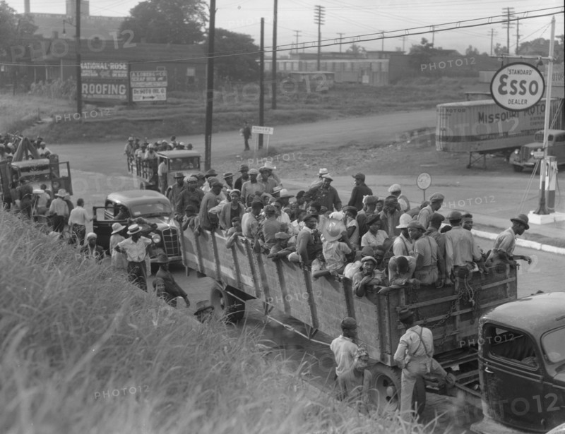 Cotton hoers loading at Memphis, Tennessee for the day's work in Arkansas, 1937. Creator: Dorothea Lange.