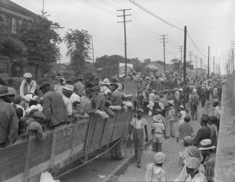 Cotton hoers loading at Memphis, Tennessee for the day's work in Arkansas, 1937. Creator: Dorothea Lange.