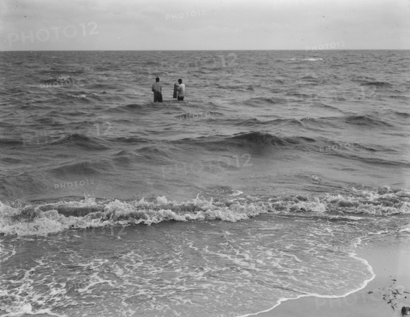 Net fishing on the Gulf of Mexico, Pass Christian, Mississippi, 1937. Creator: Dorothea Lange.