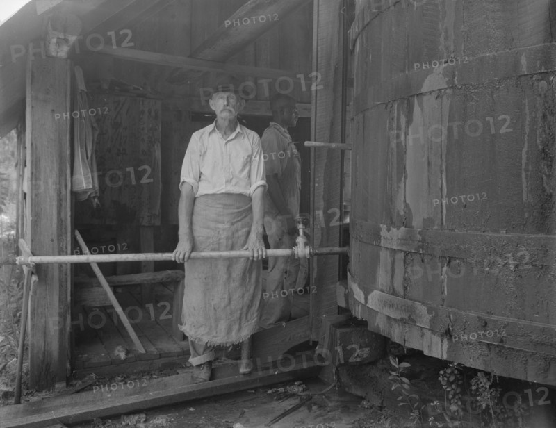 Turpentine "stiller" near Valdosta, Georgia, 1937. Creator: Dorothea Lange.