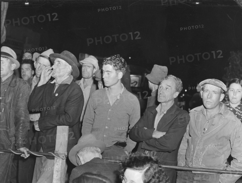 Street meeting at night...outside of Shafter, California, 1938. Creator: Dorothea Lange.