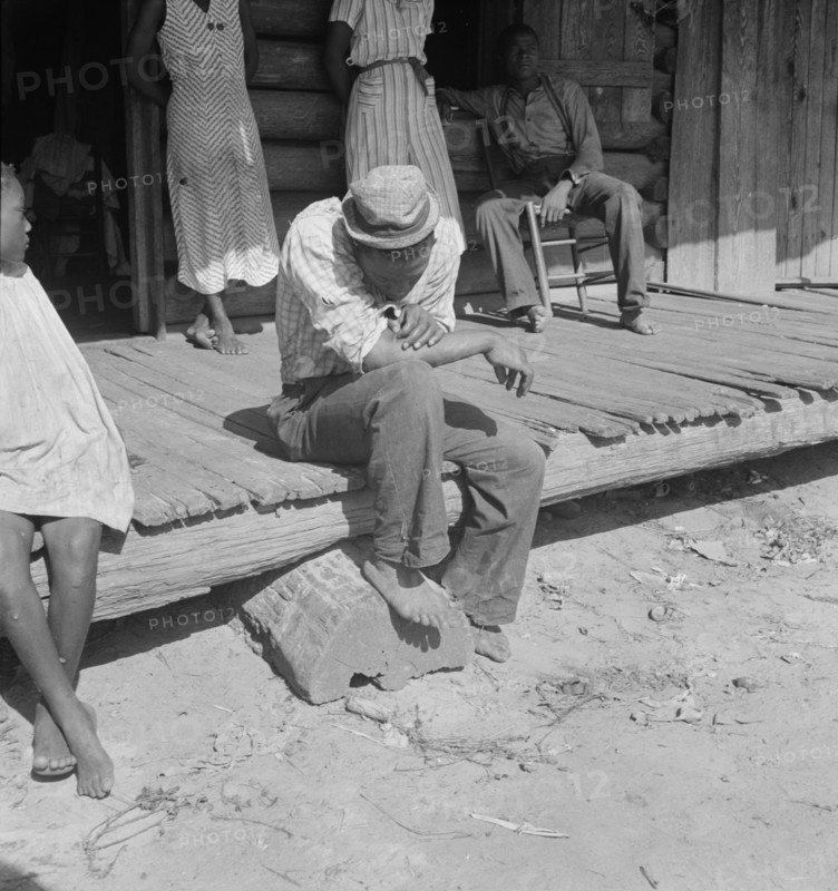 The sharecropper harvest is over in tobacco, near Tifton, Georgia, 1938. Creator: Dorothea Lange.