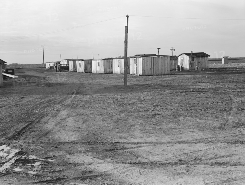 Farm Security Administration (FSA) temporary camp for migrants, Gridley, California, 1939. Creator: Dorothea Lange.