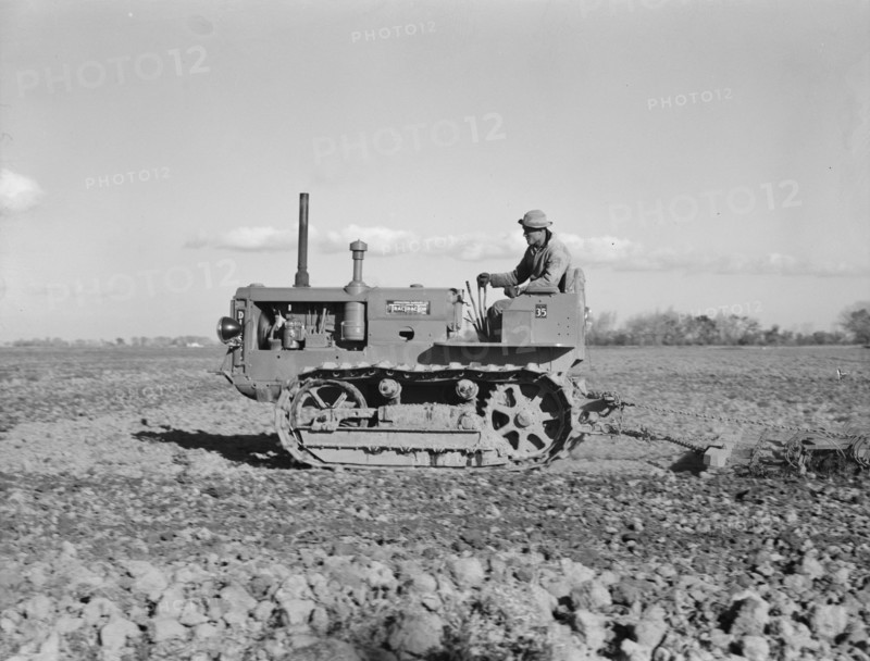Cultivating potato-fields, west side of San Joaquin Valley, California , 1939. Creator: Dorothea Lange.
