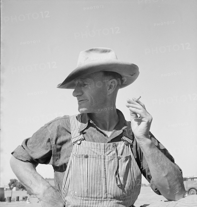 Nebraska farmer come to pick peas, near Calipatria, California, 1939. Creator: Dorothea Lange.