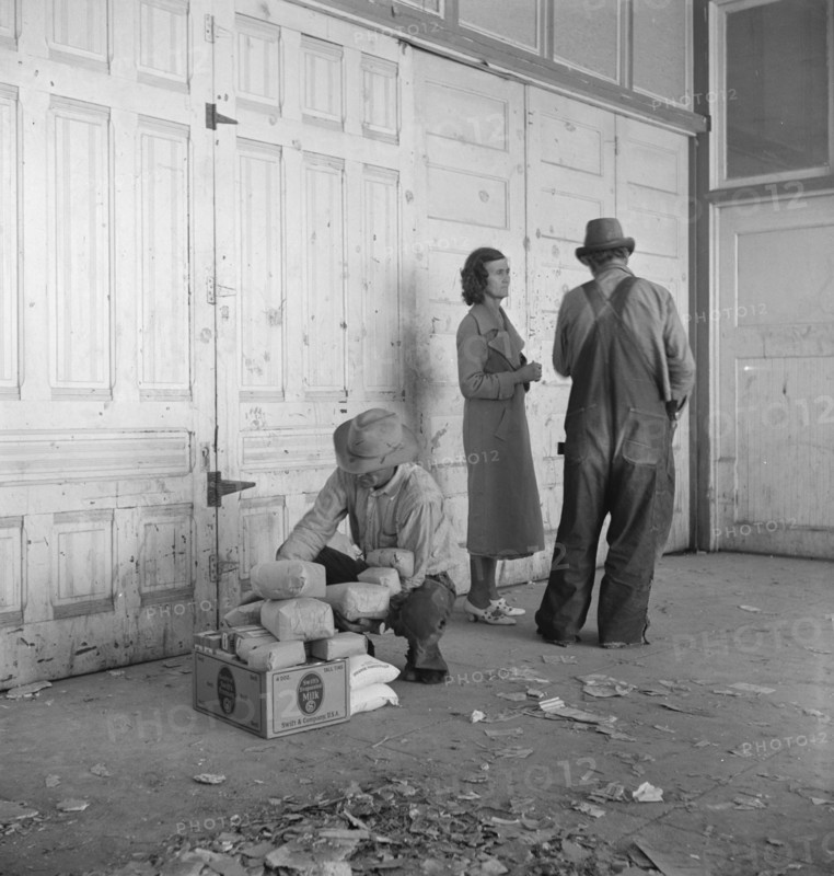 Outside the FSA grant office during pea harvest, Calipatria, California, 1939. Creator: Dorothea Lange.