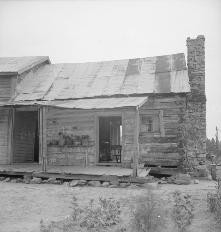 Negro sharecropper house on dirt, near Olive Hill, North Carolina, 1939. Creator: Dorothea Lange.
