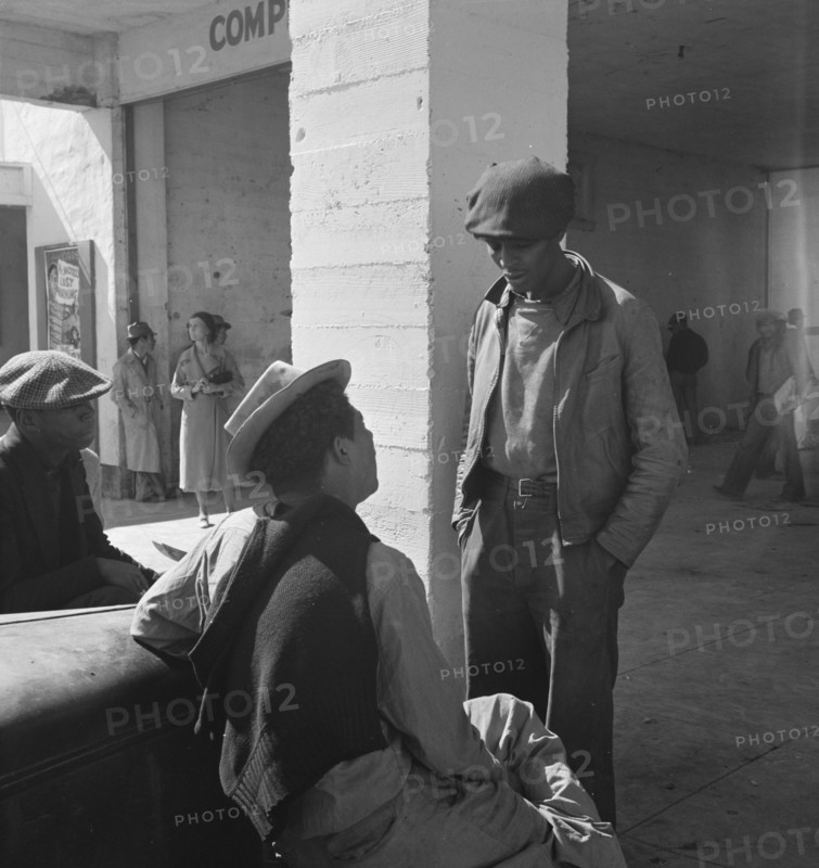 Outside the FSA grant office during the pea harvest, Calipatria, California  1939. Creator: Dorothea Lange.