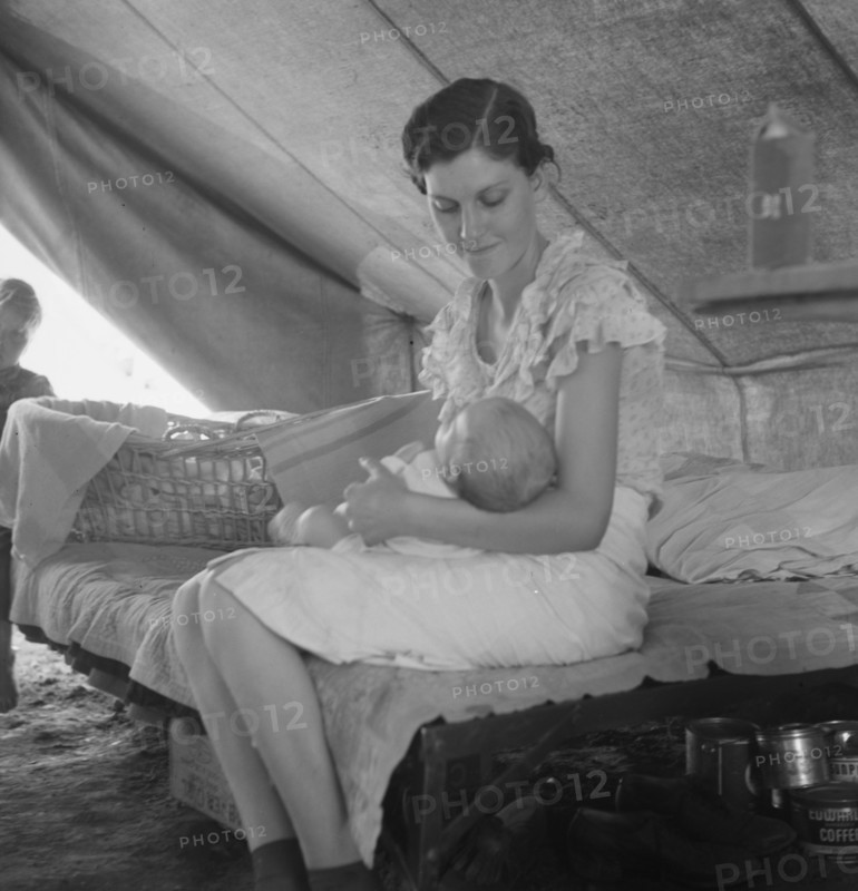 Young migrant mother with six weeks old baby born in a hospital with aid..., near Westley, CA, 1939. Creator: Dorothea Lange.