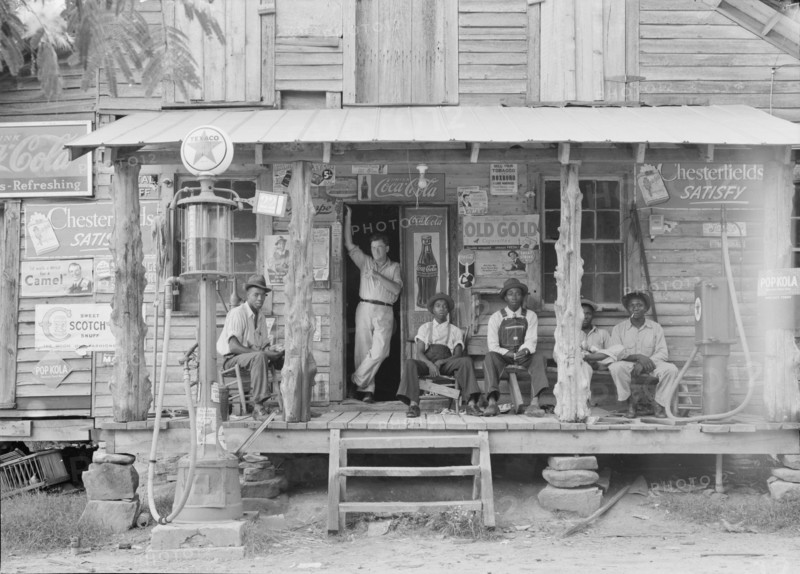 Country store on dirt road, Sunday afternoon, Gordonton, North Carolina, 1939. Creator: Dorothea Lange.