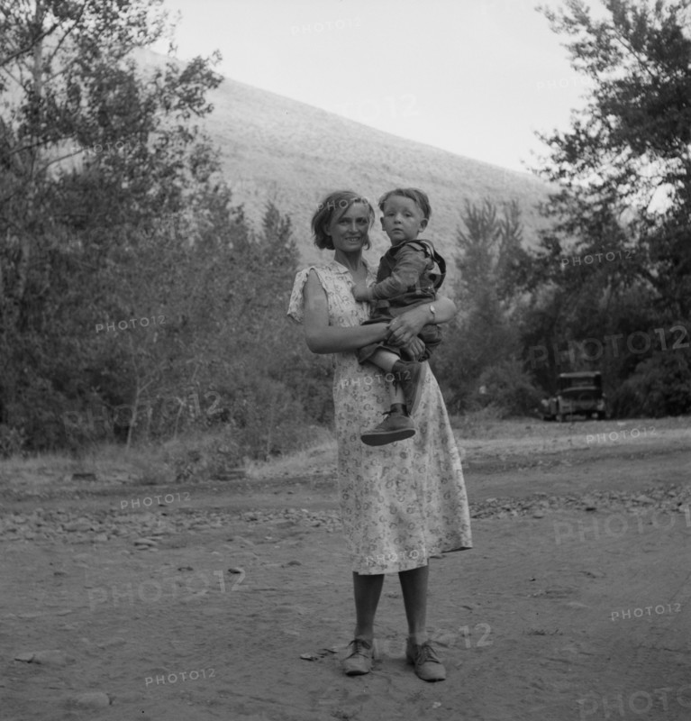 Champion hop picker in squatter camp before the season opens, Washington, Yakima Valley, 1939. Creator: Dorothea Lange.