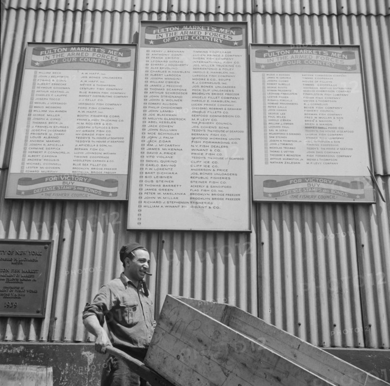 Many of the Fulton fish market men are in the armed forces, New York, 1943. Creator: Gordon Parks.