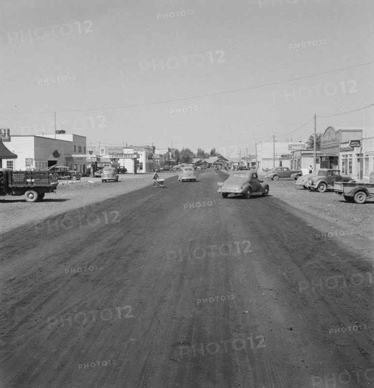 Looking down main street of a frontier town..., Tulelake, Siskiyou County, CA, 1939. Creator: Dorothea Lange.