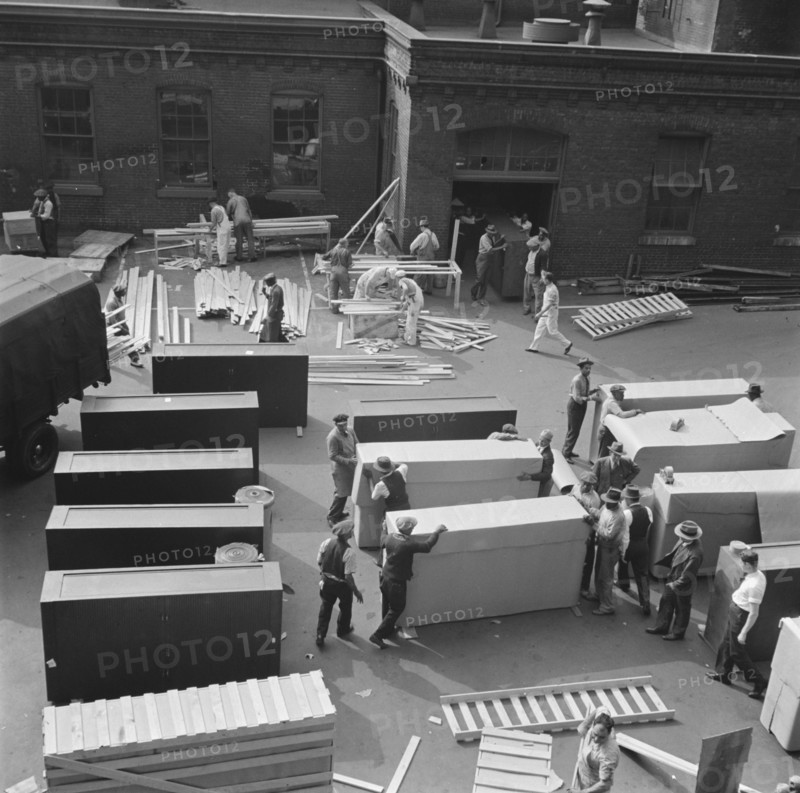 Possibly: United States government workers and carpenters making crates..., Washington, D.C., 1942. Creator: Gordon Parks.