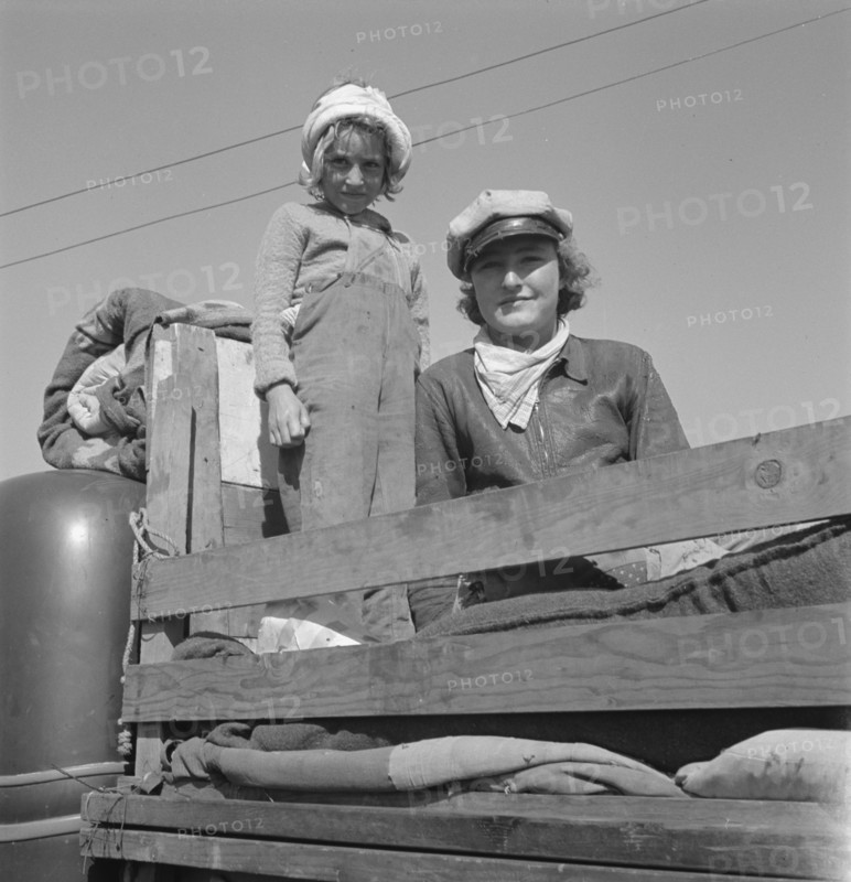 Part of family come for work in potatoes, Tulelake, Siskiyou County, California, 1939. Creator: Dorothea Lange.