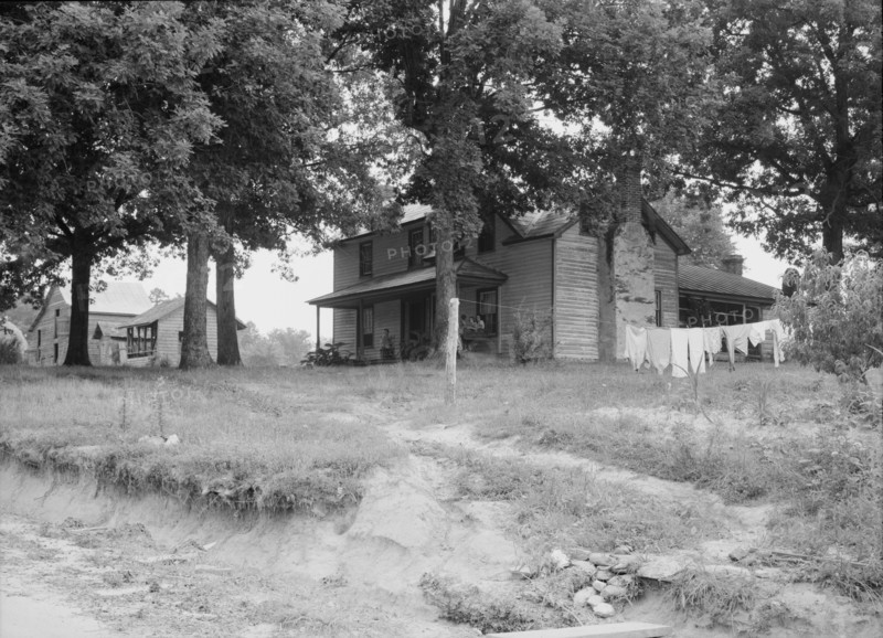 The one-and-a-half story part of this house was built fifty..., Person County, North Carolina, 1939. Creator: Dorothea Lange.