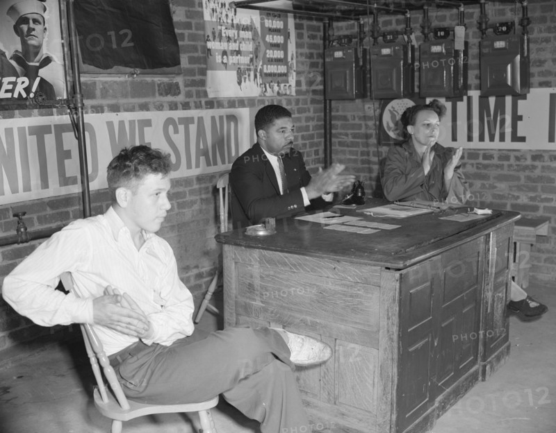 Air raid wardens' meeting in zone nine, Southwest area, Washington, D.C, 1942. Creator: Gordon Parks.