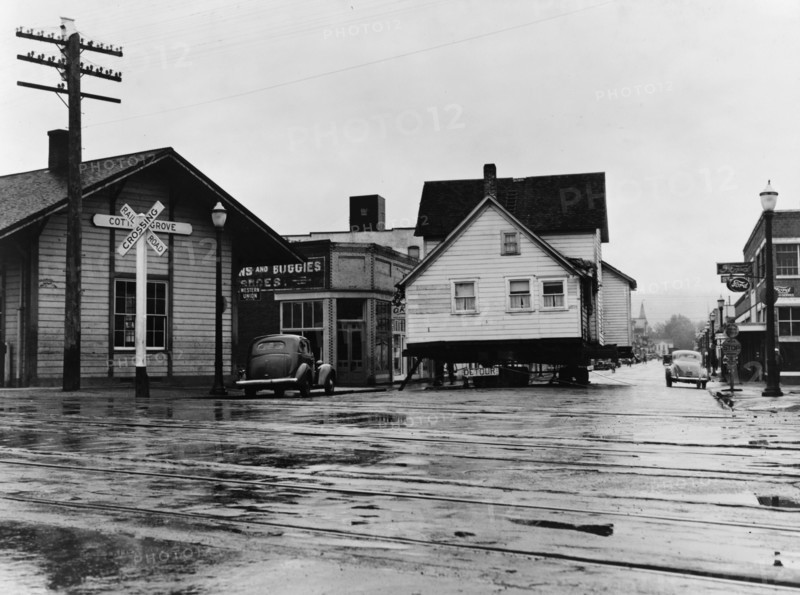 House being moved through the main street of town..., Cottage Grove, Lane County, Oregon, 1939. Creator: Dorothea Lange.