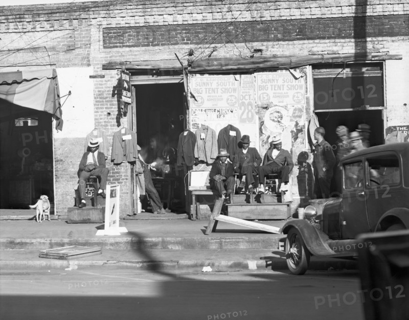Sidewalk scene in Selma, Alabama, 1935. Creator: Walker Evans.