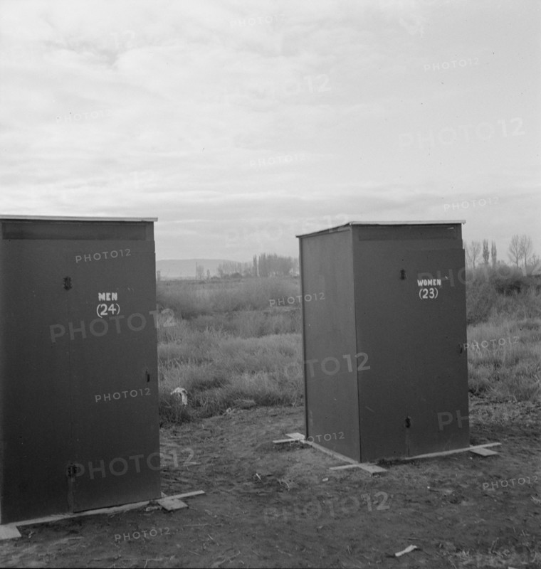 Twenty-four portable toilets, mobile camp (FSA), equipment, Merrill, Klamath County, Oregon, 1939. Creator: Dorothea Lange.