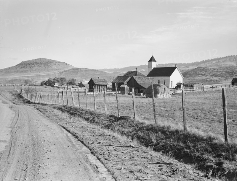 Voting farmers in Squaw Creek Valley, entering Ola, Gem County, Idaho, 1939. Creator: Dorothea Lange.