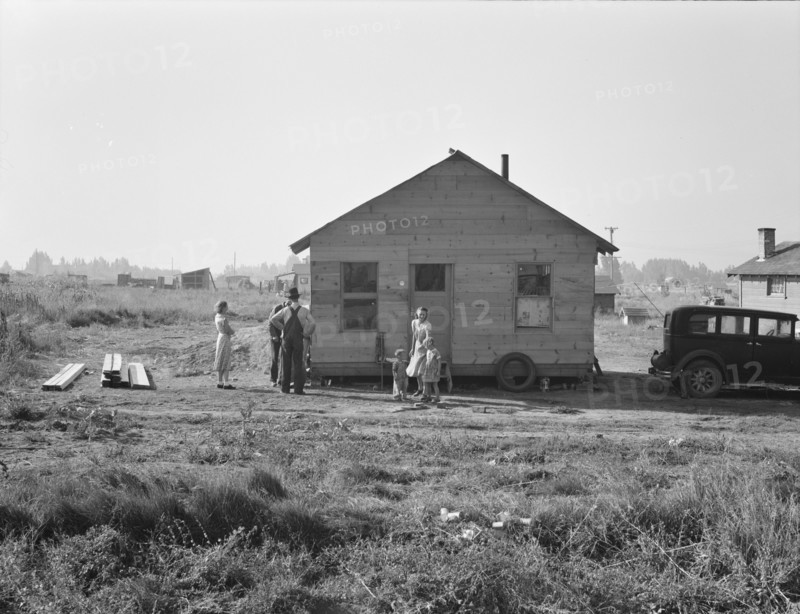 Mother and two children, husband, his brother and brother's..., near Klamath Falls, Oregon, 1939. Creator: Dorothea Lange.
