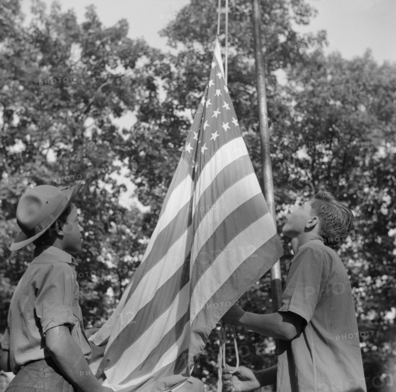 Raising Old Glory at Camp Nathan Hale, Southfields, New York, 1943 Creator: Gordon Parks.