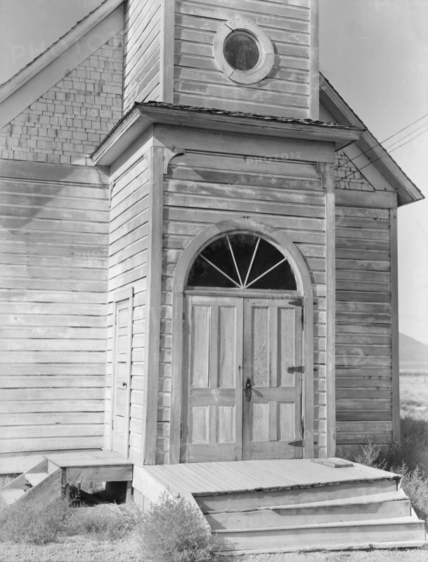 Old Catholic church on edge of potato town, Merrill, Klamath County, Oregon, 1939. Creator: Dorothea Lange.