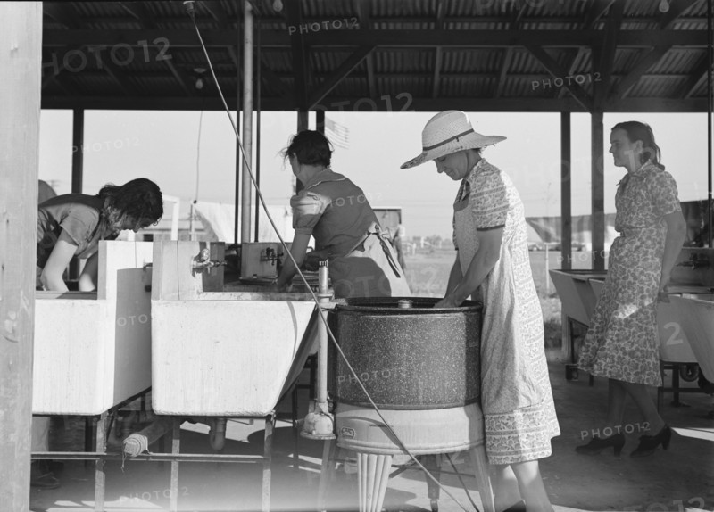 Laundry facilities in FSA migrant labor camp, Westley, California, 1939. Creator: Dorothea Lange.
