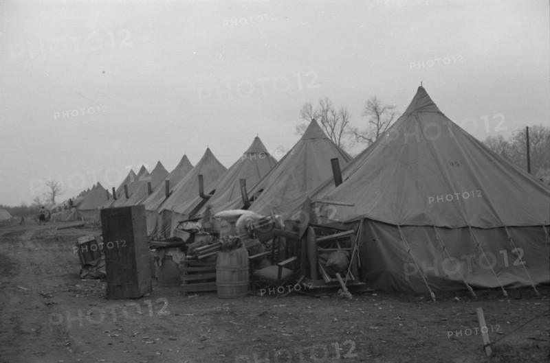 Possibly: The kitchen in the camp for white flood refugees at Forrest City, Arkansas, 1937. Creator: Walker Evans.