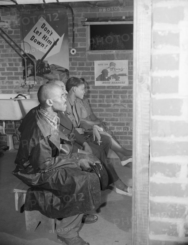 Air raid wardens' meeting in zone nine, Southwest area, Washington, D.C, 1942. Creator: Gordon Parks.