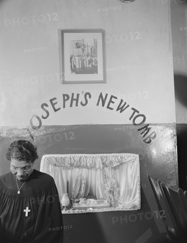 A disciple of the St. Martin's Spiritual Church keeping vigil at Saint..., Washington, D.C., 1942. Creator: Gordon Parks.