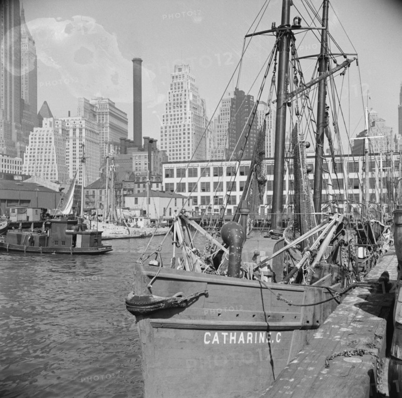 The New England fishing boat, the Catherine C, docked at the Fulton fish market, New York, 1943. Creator: Gordon Parks.