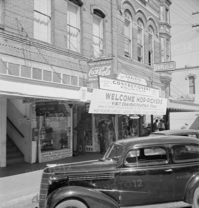 Street corner, Williamette Valley. Small town during hop season. Independence, Polk County, Oregon.