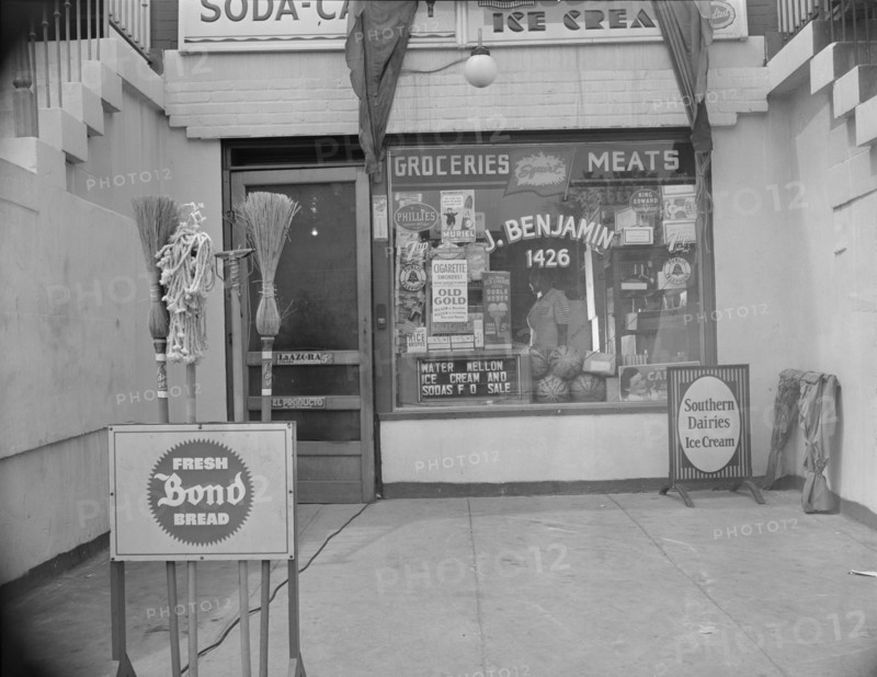 Washington, D.C. Grocery store across the street from Mrs. Ella Watson, a government charwoman.
