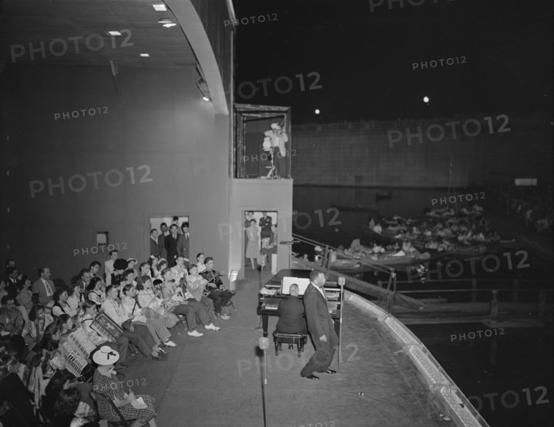 Washington, D.C. Russian war anniversary benefit at the Watergate. Paul Robeson singing.