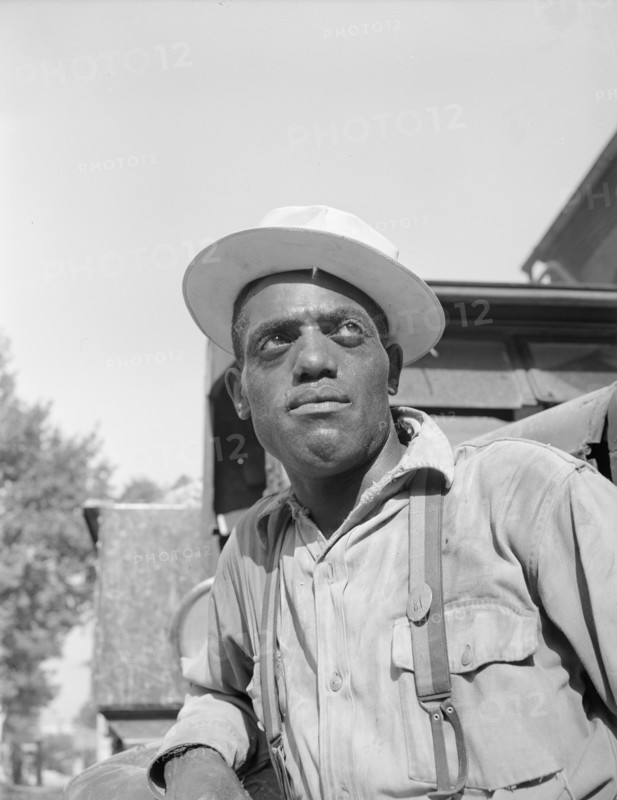 Washington, D.C. Laborer listening to instructions being given by a section foreman.