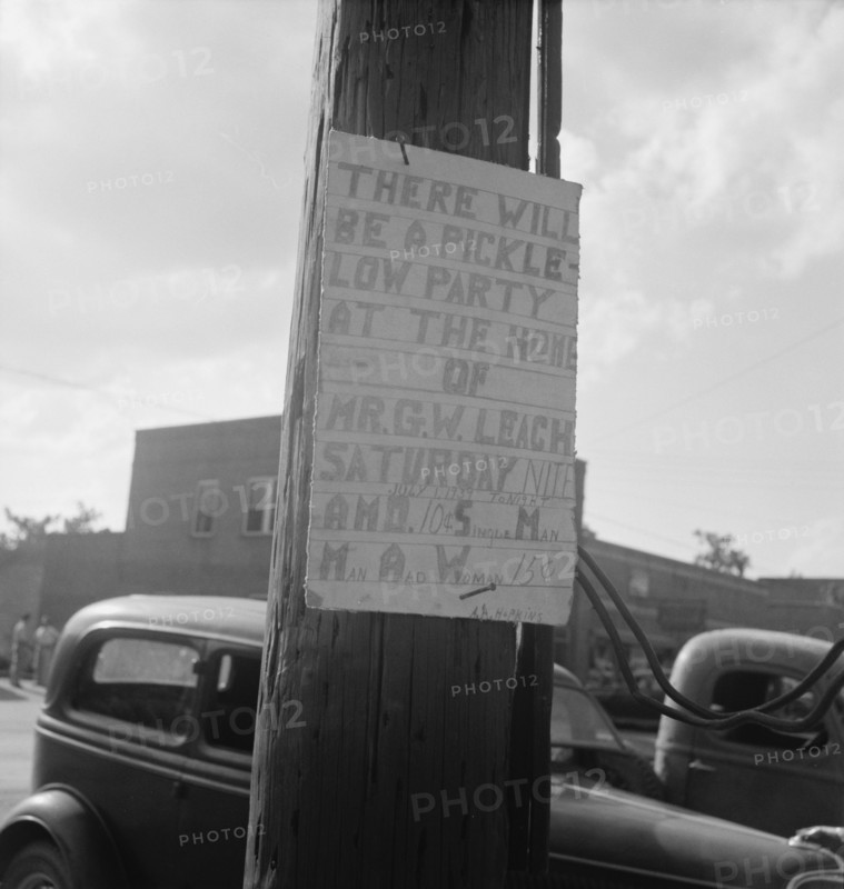 Sign tacked to pole near the post office. Main street, Pittsboro, North Carolina.